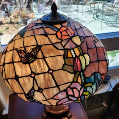 Sale Photo Thumbnail #350: Lovely handmade lamp shade with butterflies and flowers, 16 inch diameter.
The brass base is 23 inches tall.