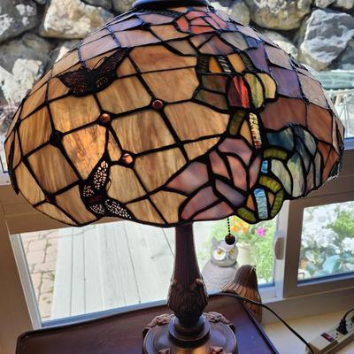 Sale Photo Thumbnail #349: Lovely handmade lamp shade with butterflies and flowers, 16 inch diameter.
The brass base is 23 inches tall.