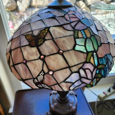 Sale Photo Thumbnail #348: Lovely handmade lamp shade with butterflies and flowers, 16 inch diameter.
The brass base is 23 inches tall.