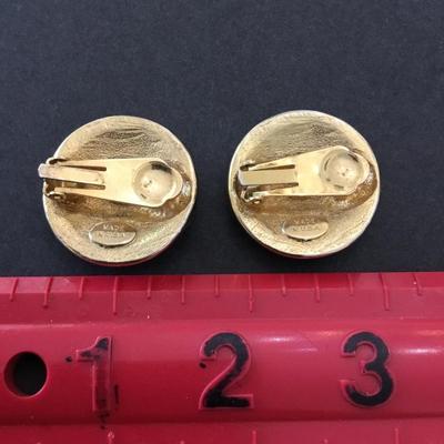Vintage made in the USA silver and gold toned circular clip on earrings. Very nice.