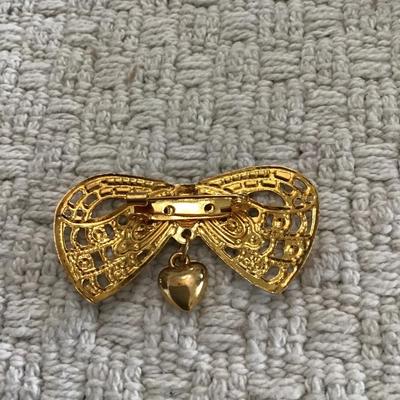 Gold tone bow brooch