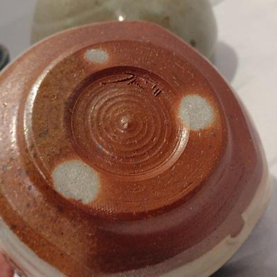 Collection of Glazed Pottery Dishes and Vase