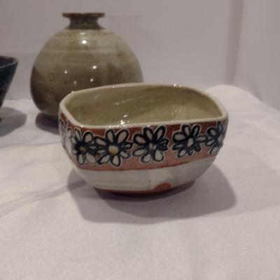 Collection of Glazed Pottery Dishes and Vase