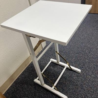Sale Photo Thumbnail #362: 4 Folding Tray tables with storage stand, and  table cloths   
Great for tv tables, trade shows, craft fairs, etc.
The tables are vey sturdy, whitewash.  Excellent condition
Retails at $200