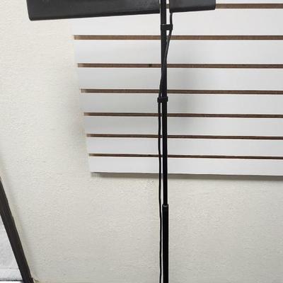 Sale Photo Thumbnail #363: Italian, Milano.   Vintage 1980s
Dana Terra tall halogen lamp 
good condition, 55 inches tall 
Retail $525.00 to $2200