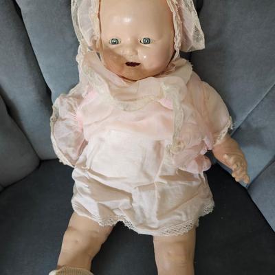 Sale Photo Thumbnail #373: 20 inch doll, composition head, cloth body, sleep eyes, 1920s 
This lovely doll shows signs of her age, see photos