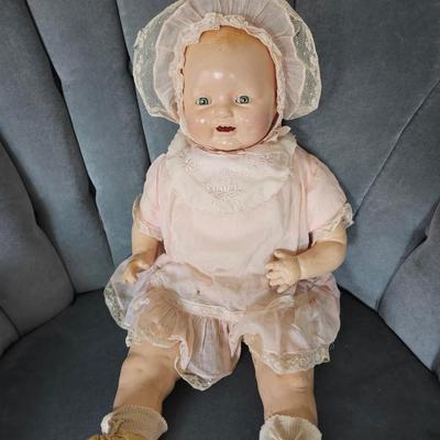 Sale Photo Thumbnail #366: 20 inch doll, composition head, cloth body, sleep eyes, 1920s 
This lovely doll shows signs of her age, see photos