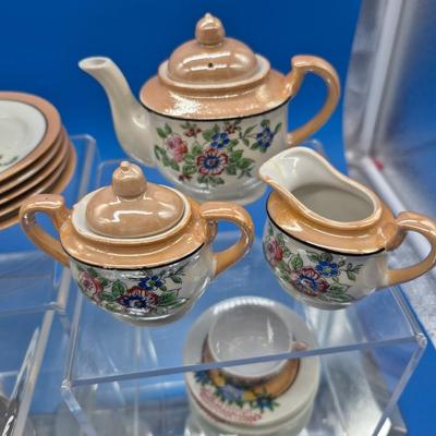 Sale Photo Thumbnail #422: Made in Japan
One set complete with teapot, sugar & creamer, 6 plates, 4 cups/saucers, 2 extra cups

One set has 4 plates, 4 saucers, 2 cups 
very nice condition, 1 previous owner 
Retail $100+