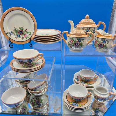 Sale Photo Thumbnail #423: Made in Japan
One set complete with teapot, sugar & creamer, 6 plates, 4 cups/saucers, 2 extra cups

One set has 4 plates, 4 saucers, 2 cups 
very nice condition, 1 previous owner 
Retail $100+