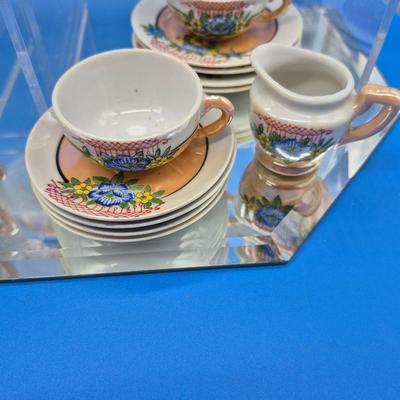 Sale Photo Thumbnail #420: Made in Japan
One set complete with teapot, sugar & creamer, 6 plates, 4 cups/saucers, 2 extra cups

One set has 4 plates, 4 saucers, 2 cups 
very nice condition, 1 previous owner 
Retail $100+