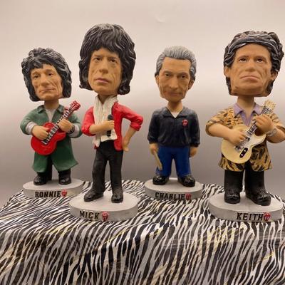 Sale Photo Thumbnail #470: Each Bobblehead features a different member of the iconic rock band, including Mick Jagger, Keith RIchards, Charlie Watts, and Ronnie Wood.  Good condition, sold as is..  Very good condition, no chips.  Approximatey 7 inches tall. The reserve must be met 