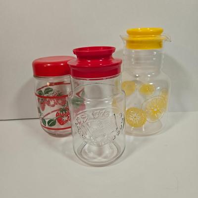 LOT 90D: Vintage Pyrex Glass Lemonade Pitcher, Strawberry Glass Red Lid Candy Jar Canister, and Anchor Hocking 1776 Bicentennial Liberty...