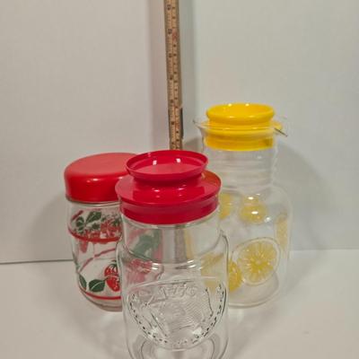 LOT 90D: Vintage Pyrex Glass Lemonade Pitcher, Strawberry Glass Red Lid Candy Jar Canister, and Anchor Hocking 1776 Bicentennial Liberty...