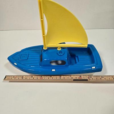 LOT 92D: Vintage Plastic Sailboats, Glass Marbles, Pez Containers, 2 Burger King Jurassic Park Watches, and More