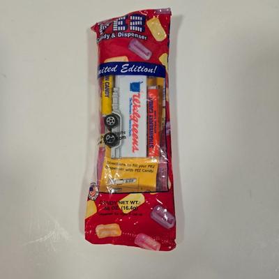 LOT 92D: Vintage Plastic Sailboats, Glass Marbles, Pez Containers, 2 Burger King Jurassic Park Watches, and More