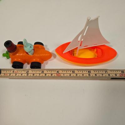 LOT 92D: Vintage Plastic Sailboats, Glass Marbles, Pez Containers, 2 Burger King Jurassic Park Watches, and More