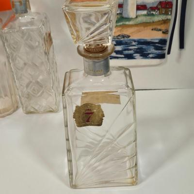 LOT 94D: Vintage Rich Full Port Wine Bottle, Leather Wrapped Decanter, Seagram's 7 Bottle, Field Birds Whiskey Decanter, Ashtrays,...