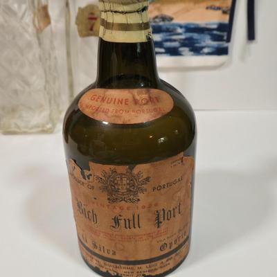 LOT 94D: Vintage Rich Full Port Wine Bottle, Leather Wrapped Decanter, Seagram's 7 Bottle, Field Birds Whiskey Decanter, Ashtrays,...