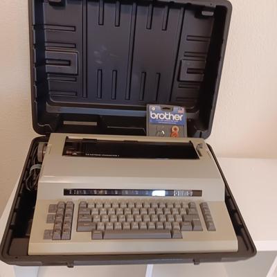BROTHER ELECTRIC TYPEWRITER AND A 5 DRAWER FILING CABINET