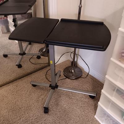 ADJUSTABLE, TILTING LAPTOP DESK ON CASTERS AND A FLOOR LAMP