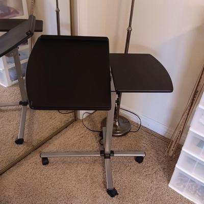ADJUSTABLE, TILTING LAPTOP DESK ON CASTERS AND A FLOOR LAMP