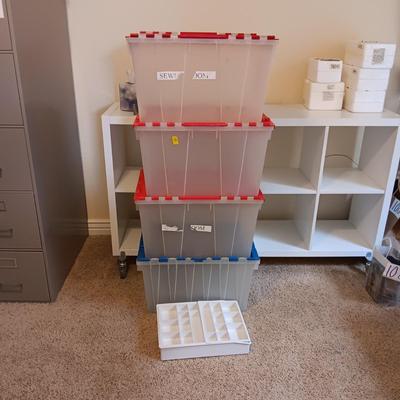 4 STORAGE TOTES AND A DRAWER ORGANIZER