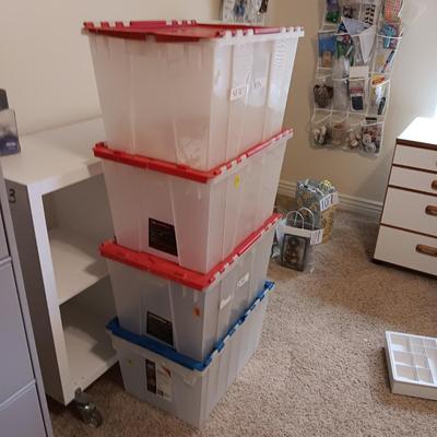 4 STORAGE TOTES AND A DRAWER ORGANIZER