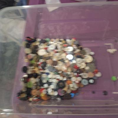 Sale Photo Thumbnail #706: this weighs OVER 15 pounds.  It is mostly buttons but also has some beads and jewelry making pieces.  We took periodic photos as things were added to the tub. The container is included.  Shipping will likely be 16 or 17 pounds and the box will have to be 