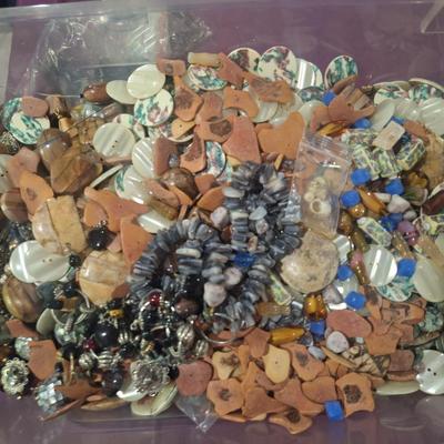 Sale Photo Thumbnail #710: this weighs OVER 15 pounds.  It is mostly buttons but also has some beads and jewelry making pieces.  We took periodic photos as things were added to the tub. The container is included.  Shipping will likely be 16 or 17 pounds and the box will have to be 