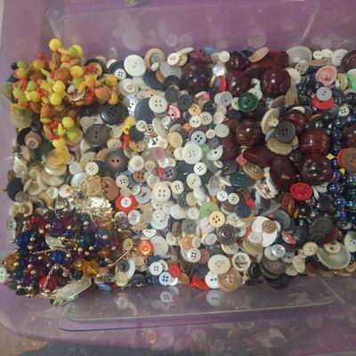 Sale Photo Thumbnail #708: this weighs OVER 15 pounds.  It is mostly buttons but also has some beads and jewelry making pieces.  We took periodic photos as things were added to the tub. The container is included.  Shipping will likely be 16 or 17 pounds and the box will have to be 