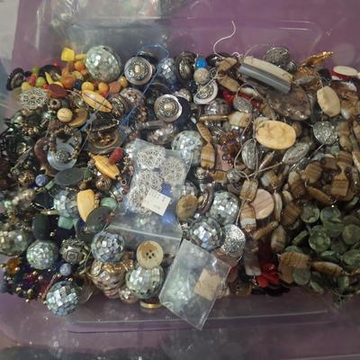 Sale Photo Thumbnail #709: this weighs OVER 15 pounds.  It is mostly buttons but also has some beads and jewelry making pieces.  We took periodic photos as things were added to the tub. The container is included.  Shipping will likely be 16 or 17 pounds and the box will have to be 