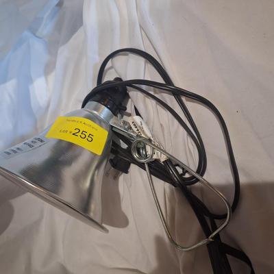 Sale Photo Thumbnail #754: has a regular bulb in it.  Use it for keeping chickens warm or under a house in a well house, or just anywhere you need a clamp light or a heat light