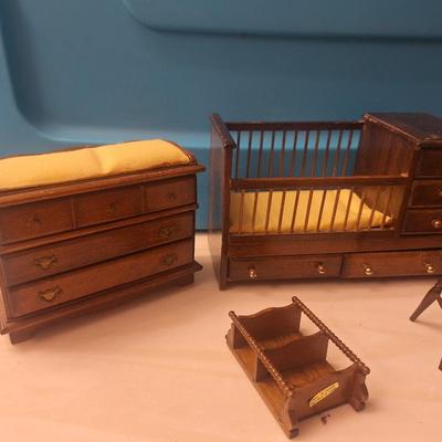 Sale Photo Thumbnail #808: some is plastic and some is wooden.  All about the same scale- smaller than barbie size more like what a dawn doll size would be.  Look at the baby bed and the sectional sofa….cool stuff.