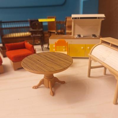 Sale Photo Thumbnail #806: some is plastic and some is wooden.  All about the same scale- smaller than barbie size more like what a dawn doll size would be.  Look at the baby bed and the sectional sofa….cool stuff.