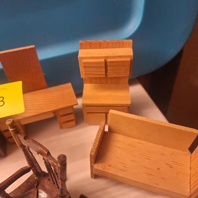 Sale Photo Thumbnail #812: some is plastic and some is wooden.  All about the same scale- smaller than barbie size more like what a dawn doll size would be.  Look at the baby bed and the sectional sofa….cool stuff.