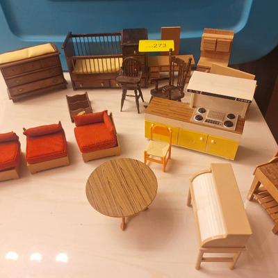 Sale Photo Thumbnail #805: some is plastic and some is wooden.  All about the same scale- smaller than barbie size more like what a dawn doll size would be.  Look at the baby bed and the sectional sofa….cool stuff.