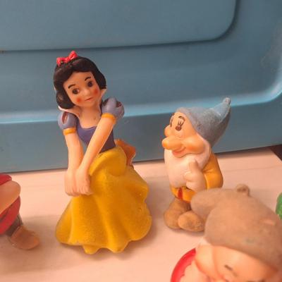 Sale Photo Thumbnail #817: There is only 6 dwarves. Also all of these have some hot glue on the bottom like they used to be glued to something.