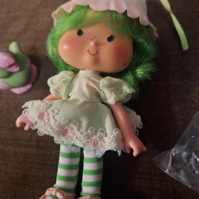 Sale Photo Thumbnail #840: vintage lime chiffon doll with pet from Strawberry Shortcake