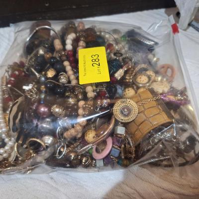 Sale Photo Thumbnail #860: some may be complete items but it is mostly pieces, beads, mismatched earrings etc.
