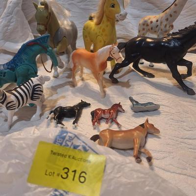 Sale Photo Thumbnail #984: see all photos.  Might be a few non horses in there like a Giraffe, zerbra and some kind of alien horse