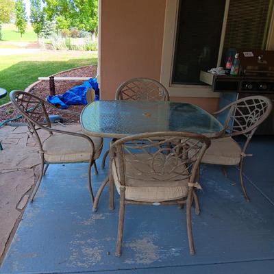 HAMPTON BAY GLASS TOP PATIO TABLE WITH 4 CHAIRS