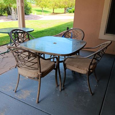 HAMPTON BAY GLASS TOP PATIO TABLE WITH 4 CHAIRS
