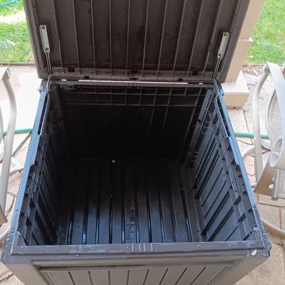 2 ROCKING SWIVEL PATIO CHAIRS AND A PLASTIC STORAGE BOX