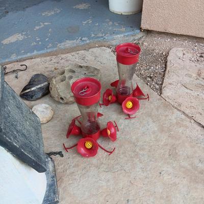 A UNIQUE BIRDHOUSE, HUMMINGBIRD FEEDERS AND SOME UNUSUAL ROCKS
