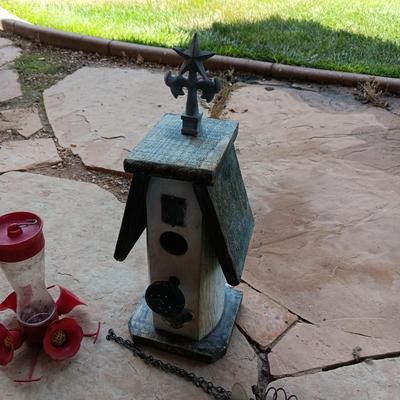 A UNIQUE BIRDHOUSE, HUMMINGBIRD FEEDERS AND SOME UNUSUAL ROCKS