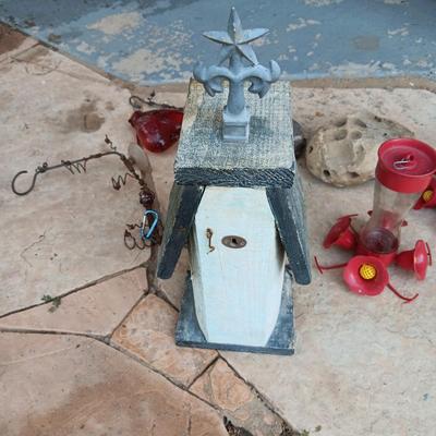 A UNIQUE BIRDHOUSE, HUMMINGBIRD FEEDERS AND SOME UNUSUAL ROCKS