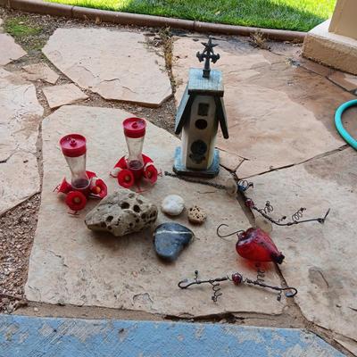 A UNIQUE BIRDHOUSE, HUMMINGBIRD FEEDERS AND SOME UNUSUAL ROCKS