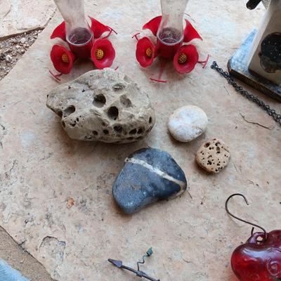 A UNIQUE BIRDHOUSE, HUMMINGBIRD FEEDERS AND SOME UNUSUAL ROCKS