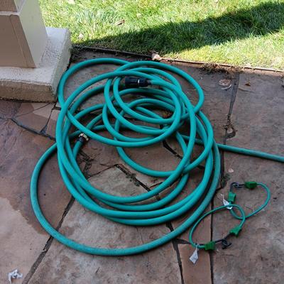 2 GARDEN HOSES AND A NICE POWERFUL SPRAYER