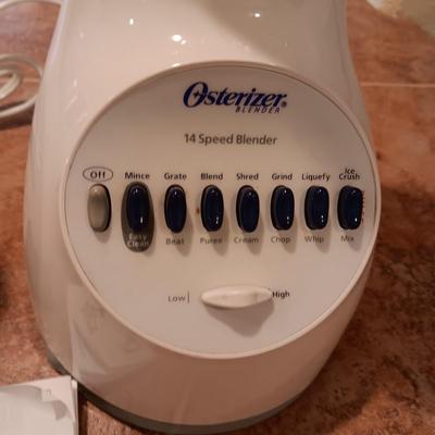 OSTER 14 SPEED BLENDER AND A COFFEE BEAN GRINDER